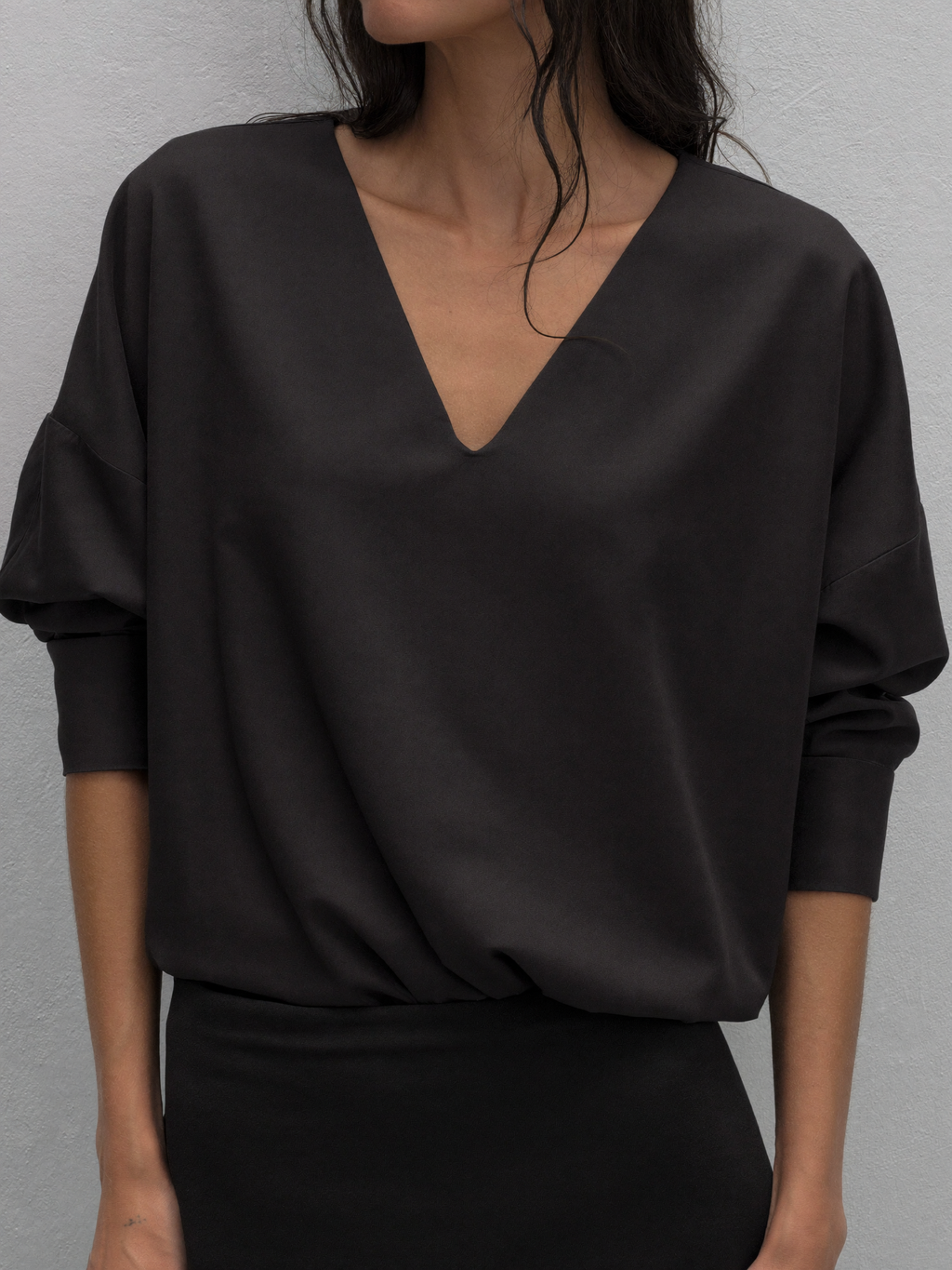 Estelle longline V-neck blouse in black