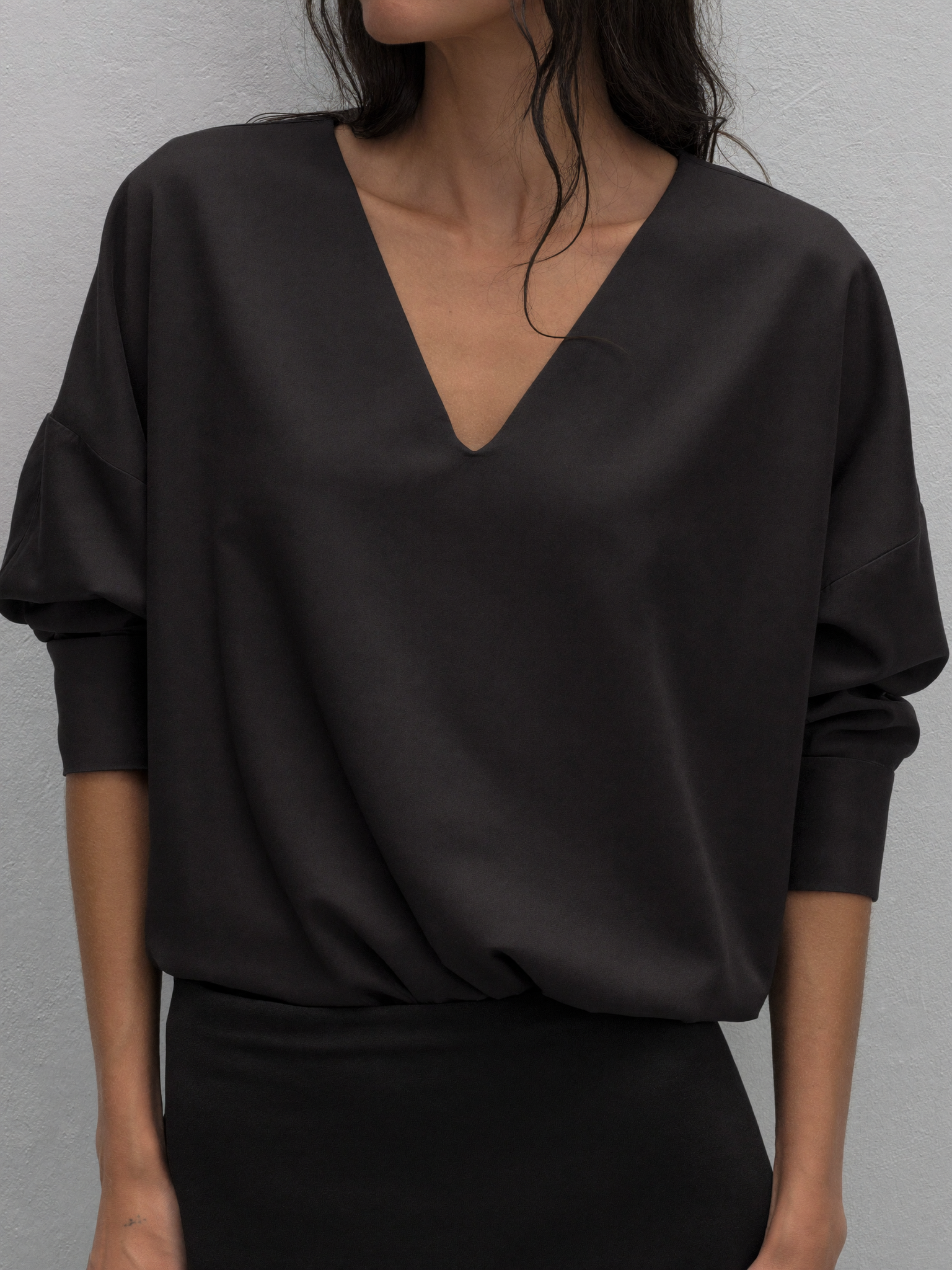 Estelle longline V-neck blouse in black